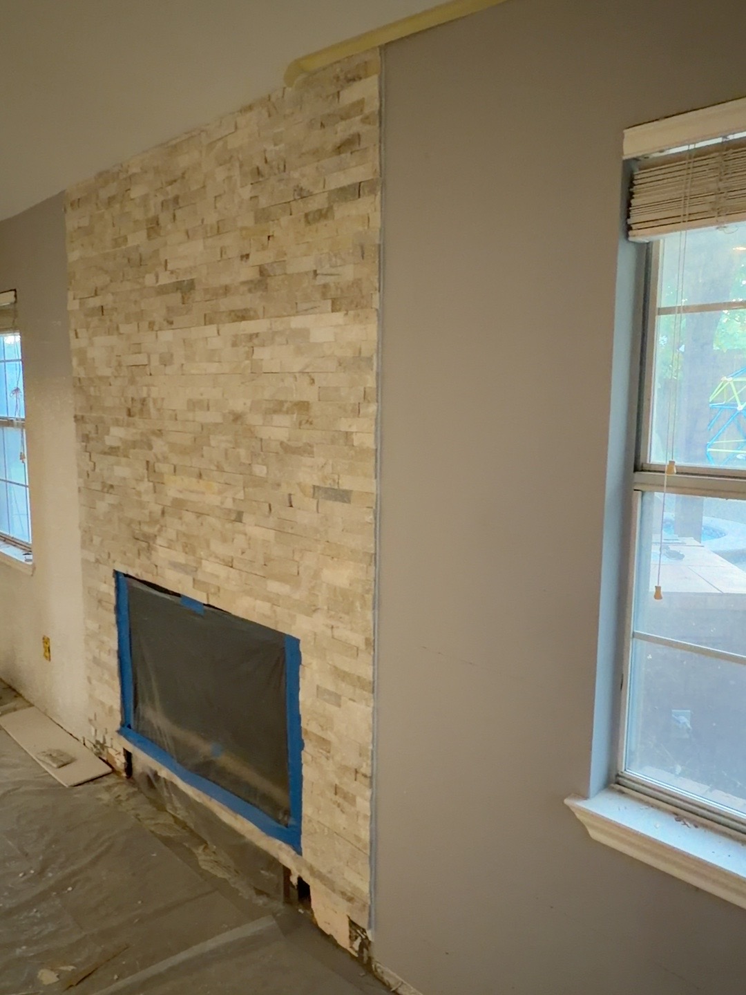 Angled view of existing fireplace face