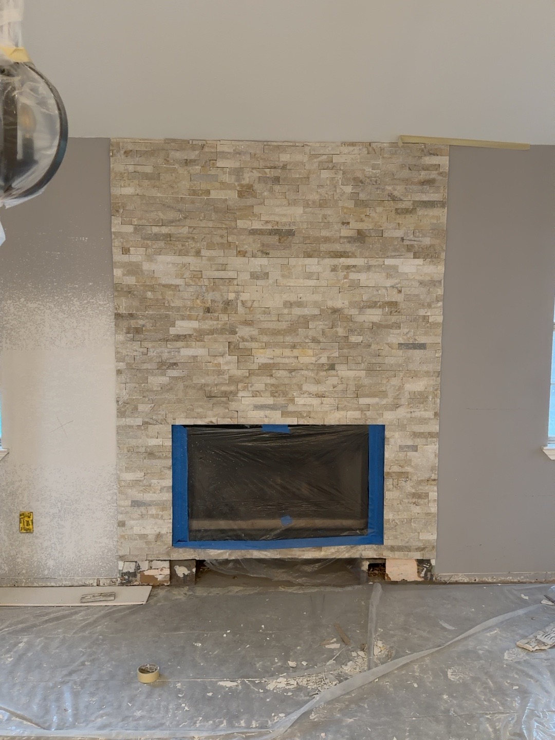 Front view of existing stone fireplace